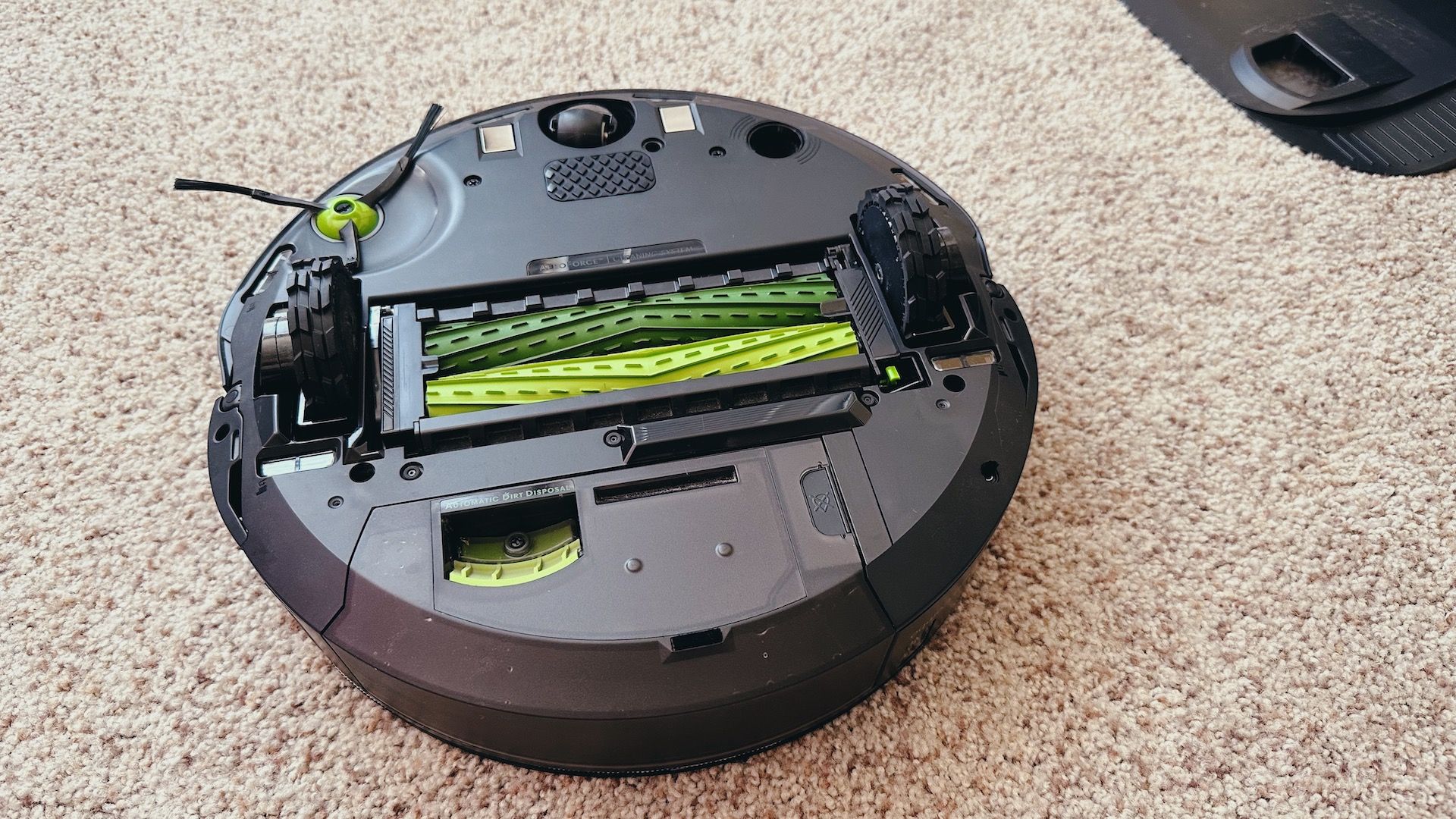 showing the underneath of a robot vacuum