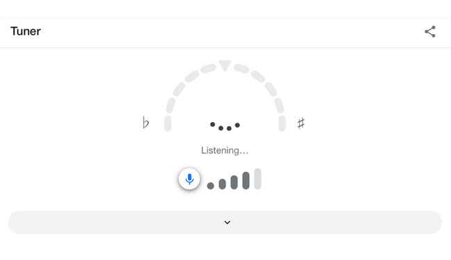 Google Guitar Tuner showing the "listening" message