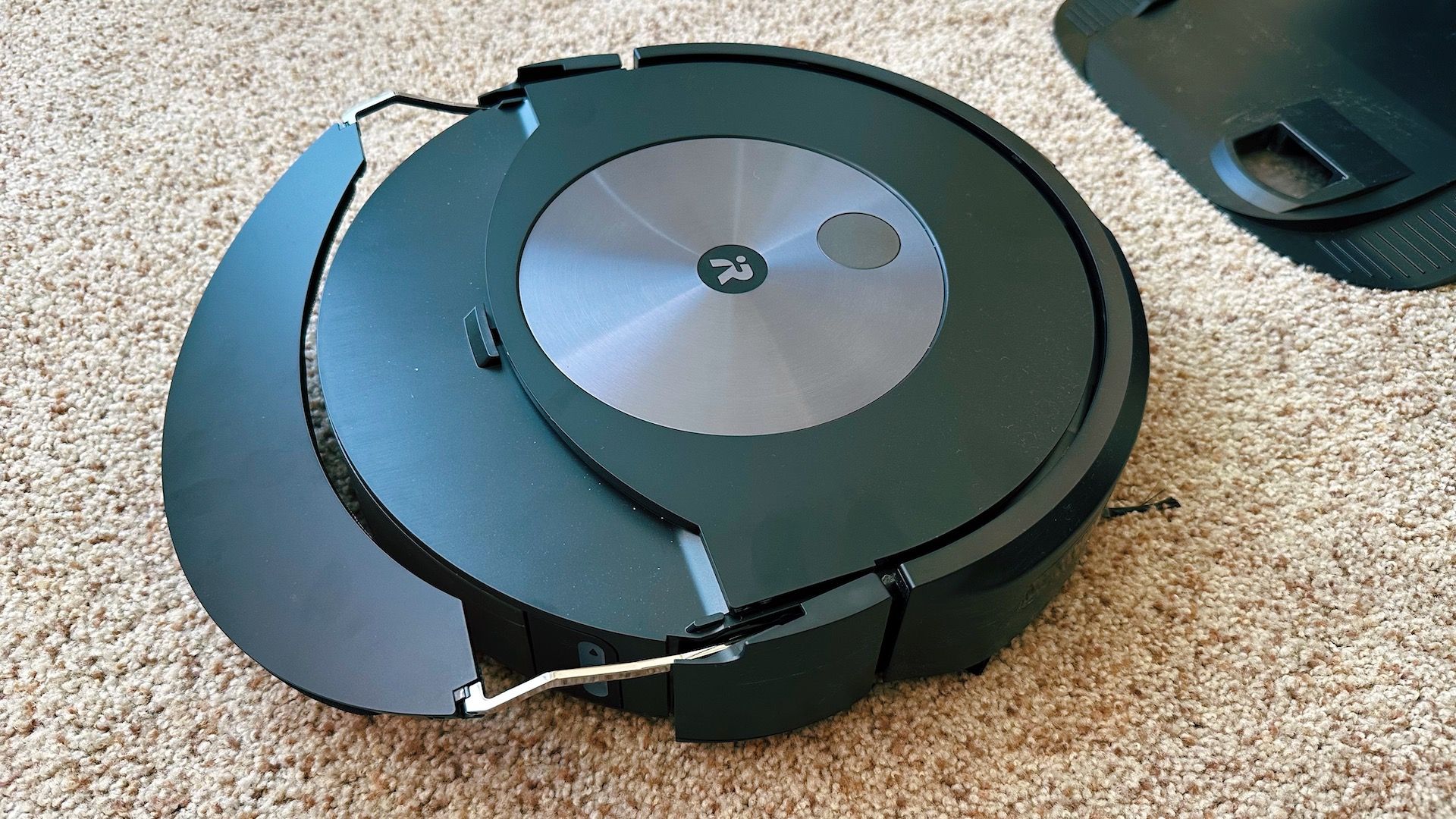 Roomba j7+ moving its mop pad into position