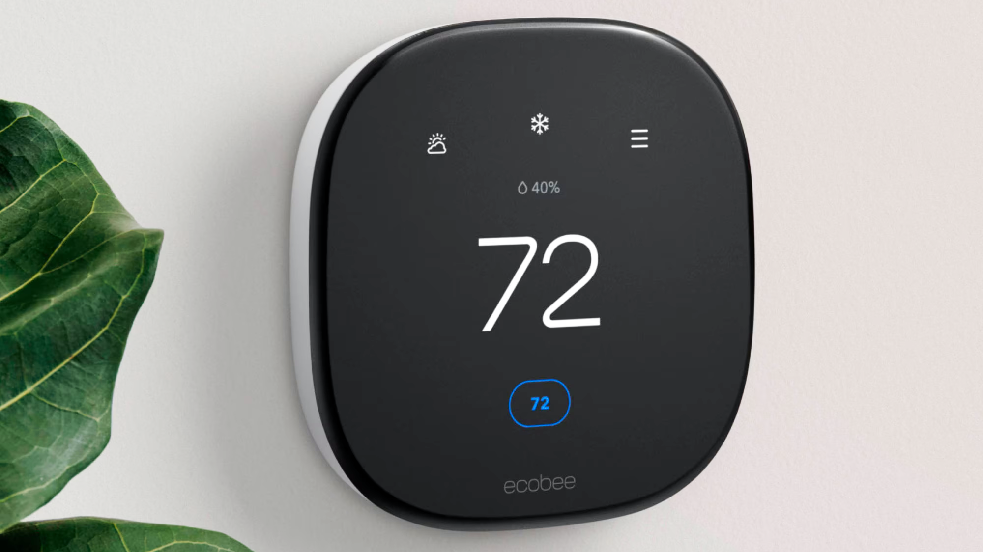 ecobee Smart Thermostat Enhanced hanging on a wall
