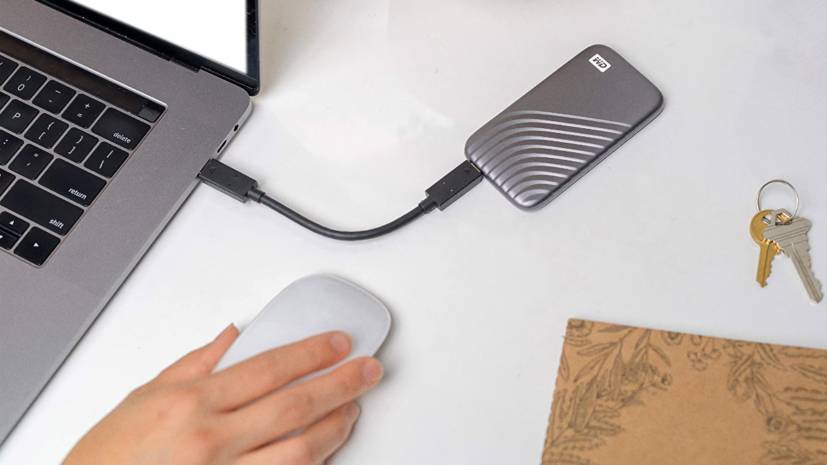 WD 1TB My Passport Portable External SSD plugged into a MacBook