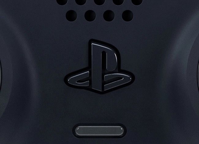 The PlayStation button on a PS5 controller.