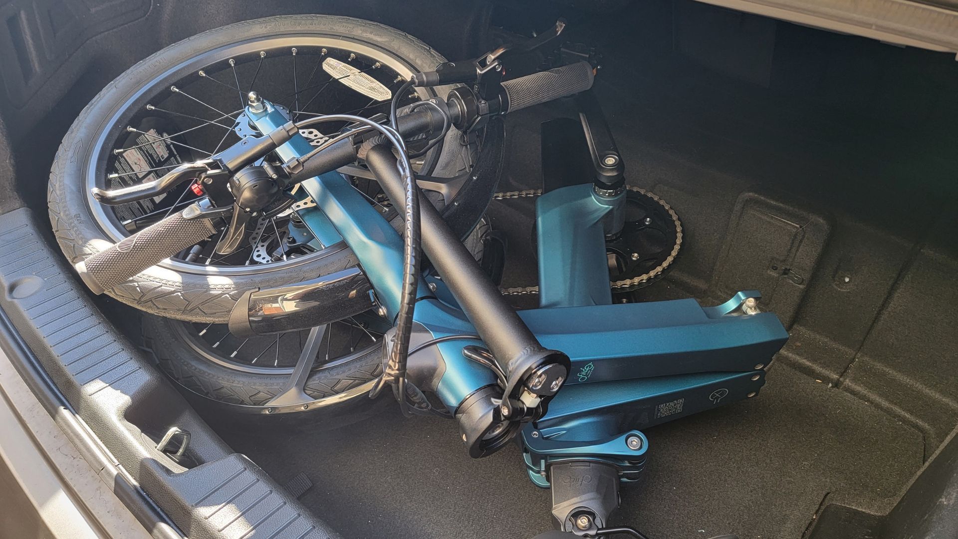 fiido x folding e-bike in trunk of a car