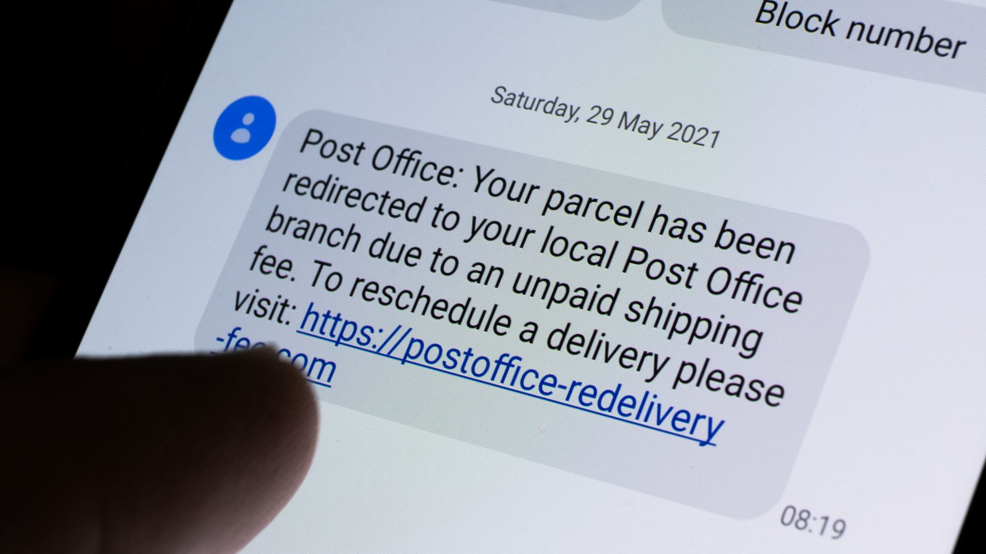 Scam text message for package delivery.