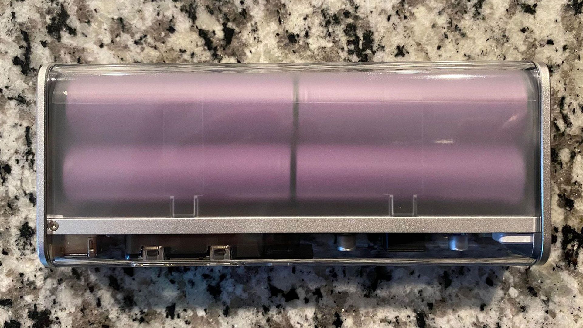 Shargeek Storm 2 Slim clear case showing four purple batteries