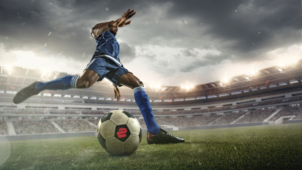 Soccer player kicking a ball with an ExpressVPN logo on it