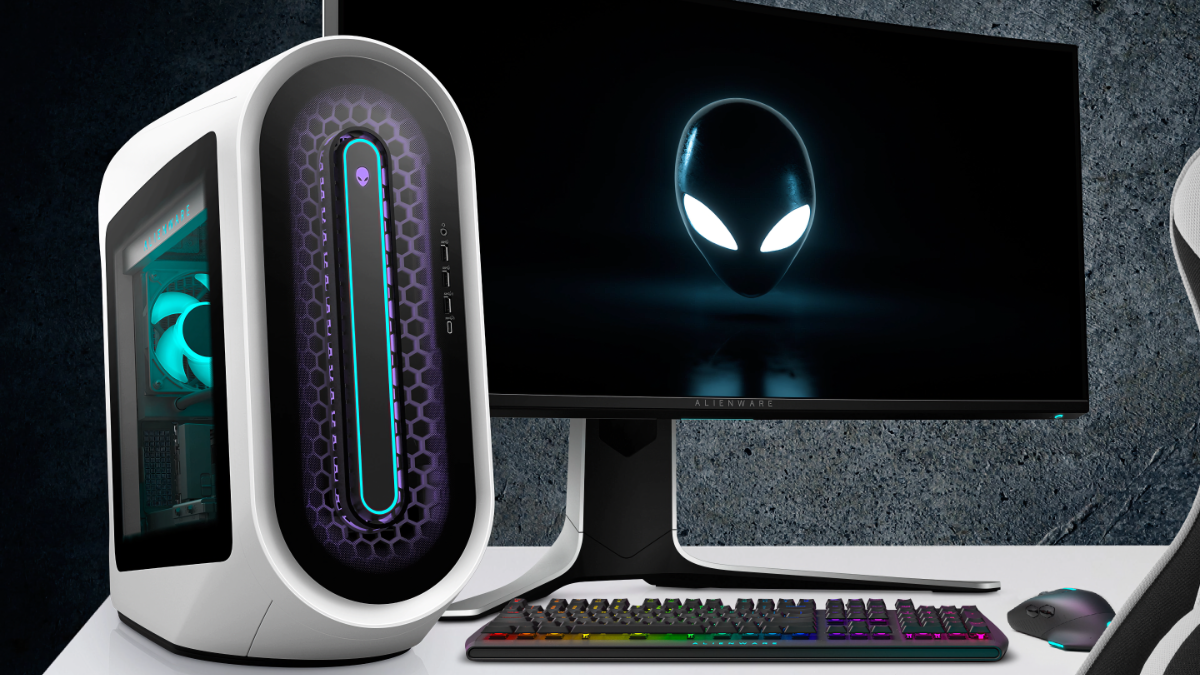 Alienware Aurora R13 Gaming Desktop sitting beside a computer monitor