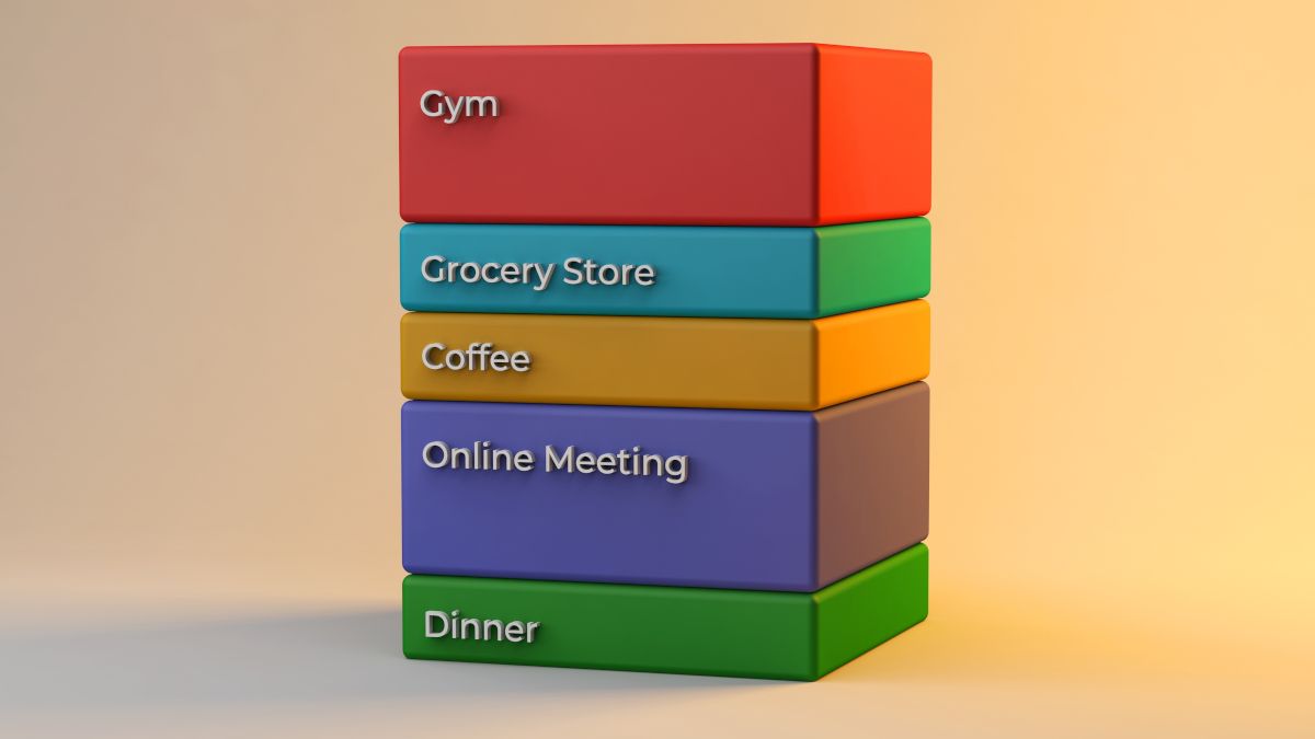 3D rendering of a stack of multicolored blocks, each labelled with different tasks to illustrate the concept of time blocking.