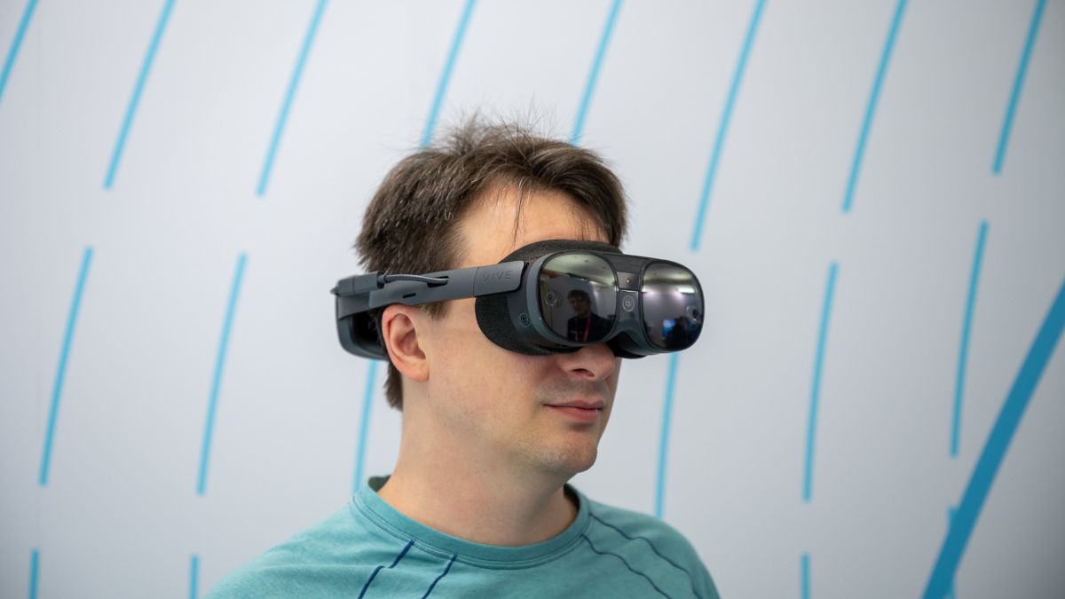 Person wearing the HTC Vive XR Elite virtual reality headset.