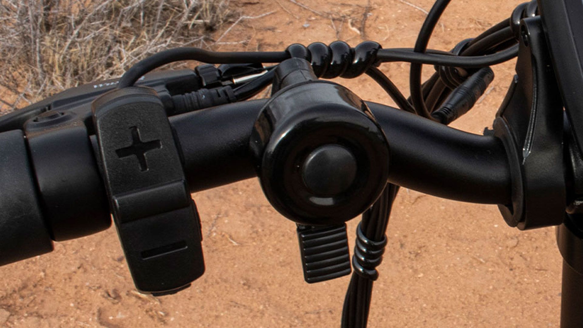 Pedal assist shifter and bell attached to ENGWE EP-2 Pro handlebar.