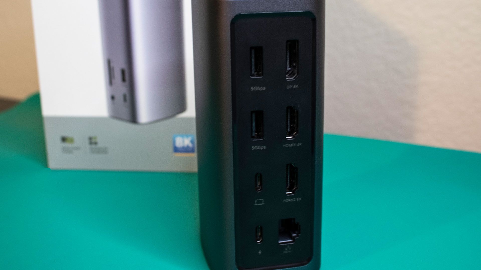 Rear of UGREEN USB-C docking station showing HDMI, USB, and Ethernet ports