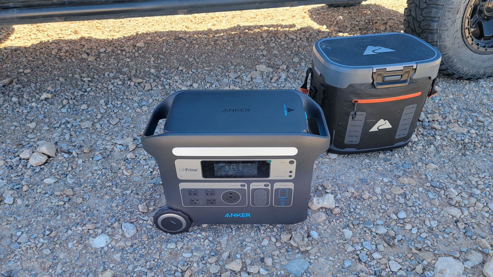 Anker 767 next to a cooler for size comparison.