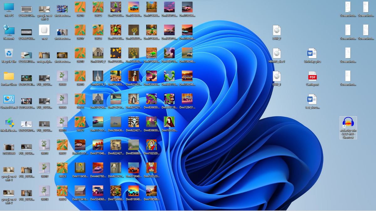 A Windows 11 desktop covered in icons.