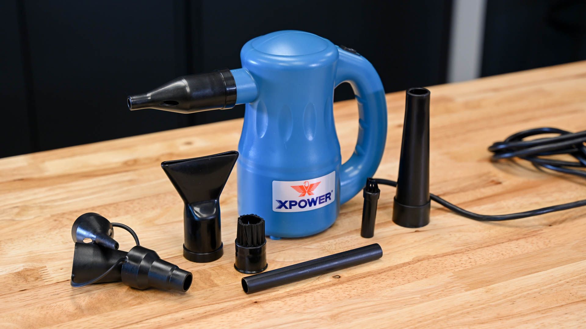 XPOWER Electric Air Duster surrounded by attachments and nozzles
