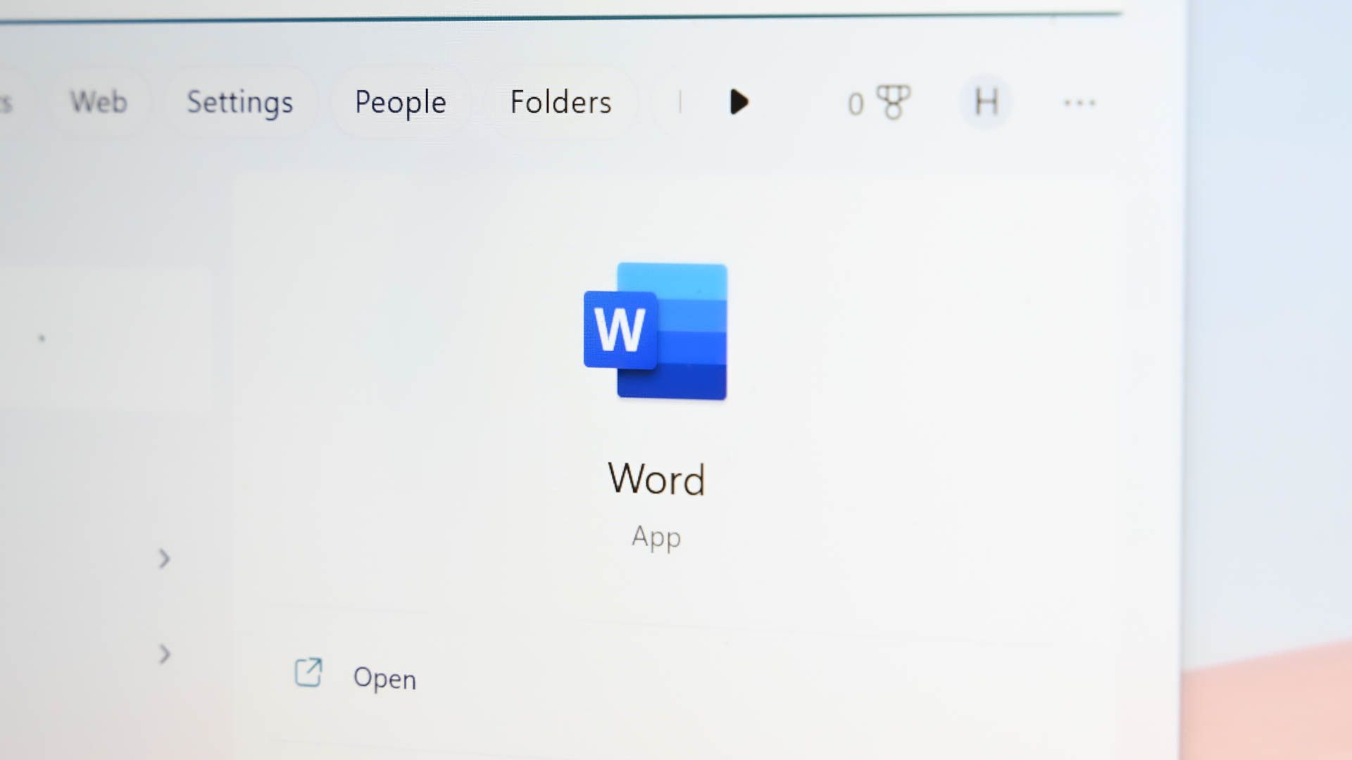 Microsoft Word icon in a Windows app launcher.