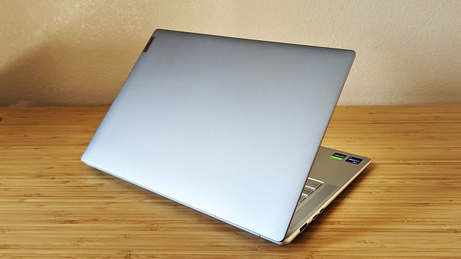 The Lenovo Slim 7i Pro X laptop on a desk.