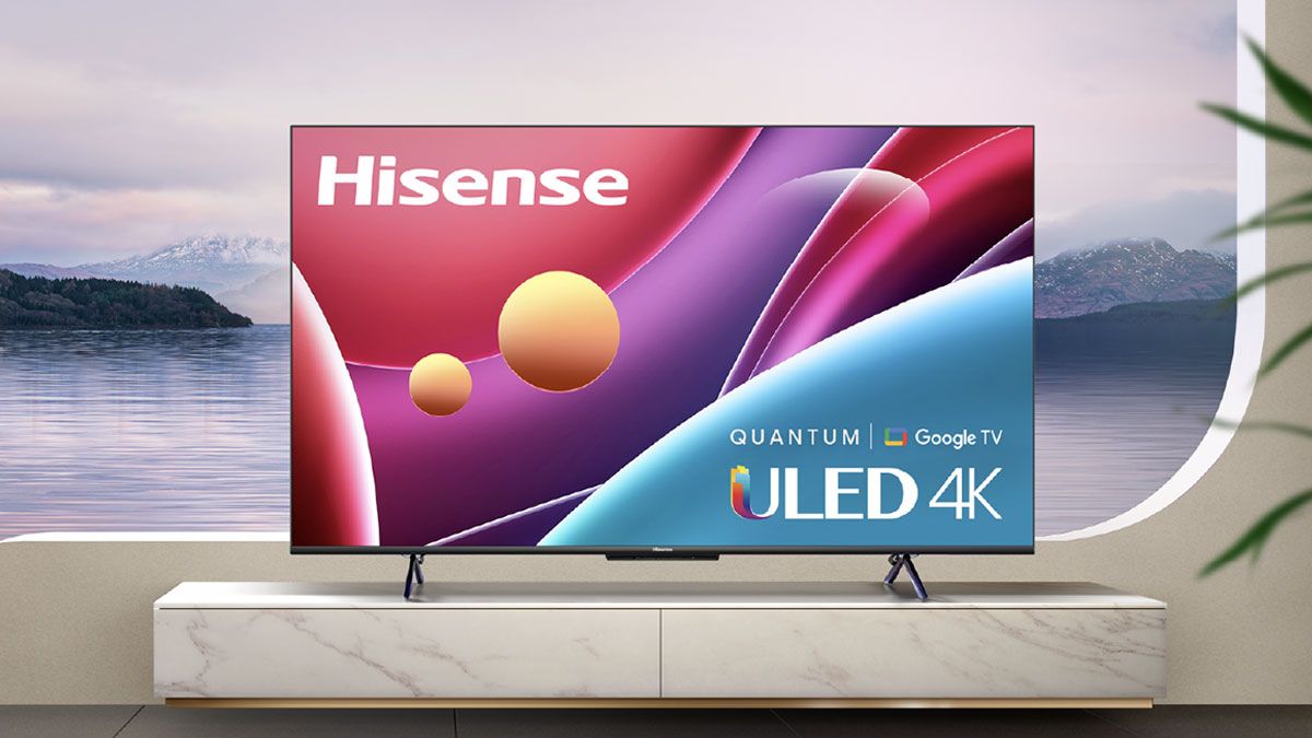 Hisense 65" Class U6H Series Quantum ULED 4K Smart Google TV on a table in front of a lake backdrop