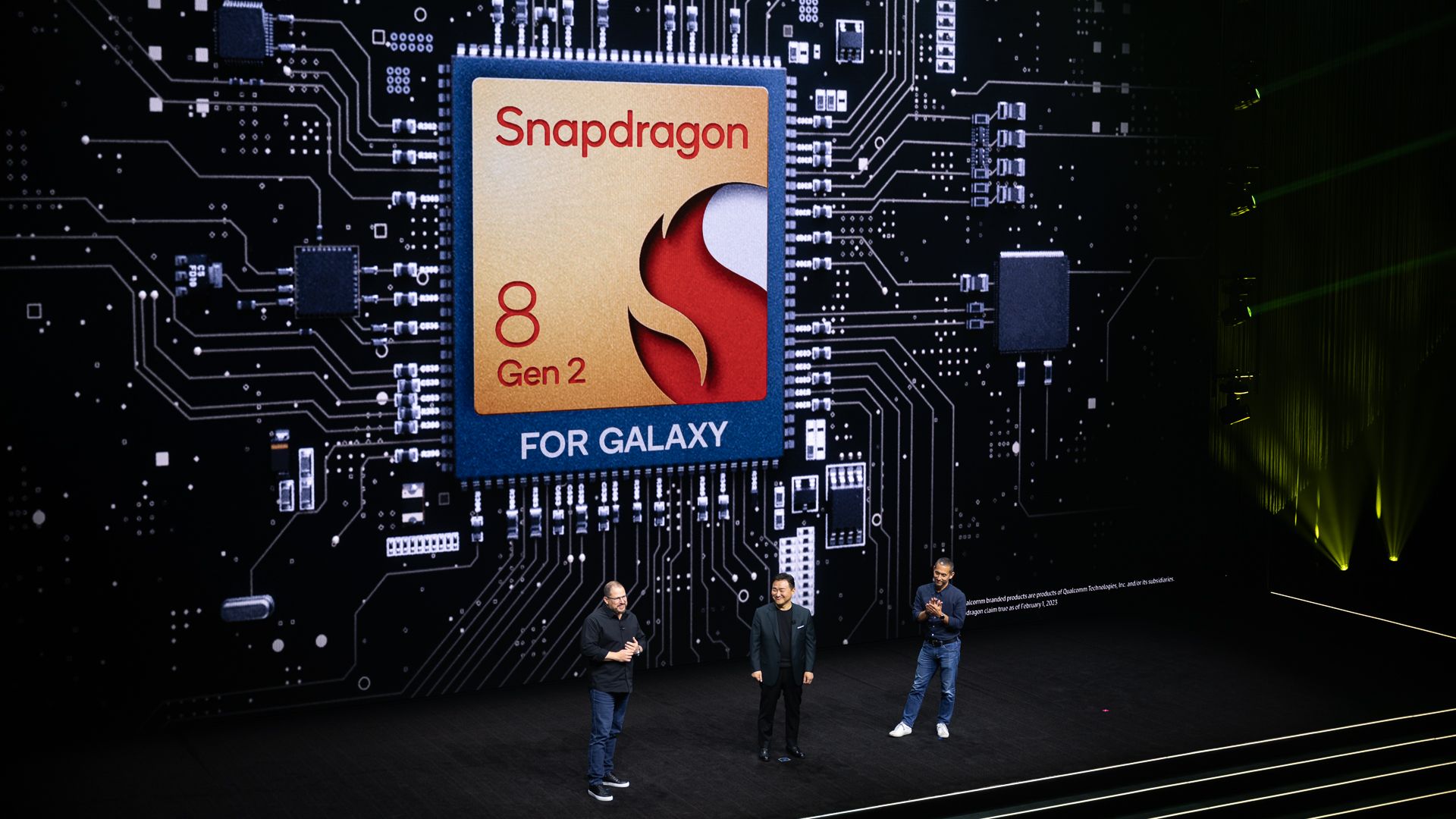 TM Roh, Cristiano Amon, and Hiroshi Lockheimer presenting at Galaxy Unpacked 2023 with the Snapdragon 8 Gen 2 for Galaxy icon on the screen
