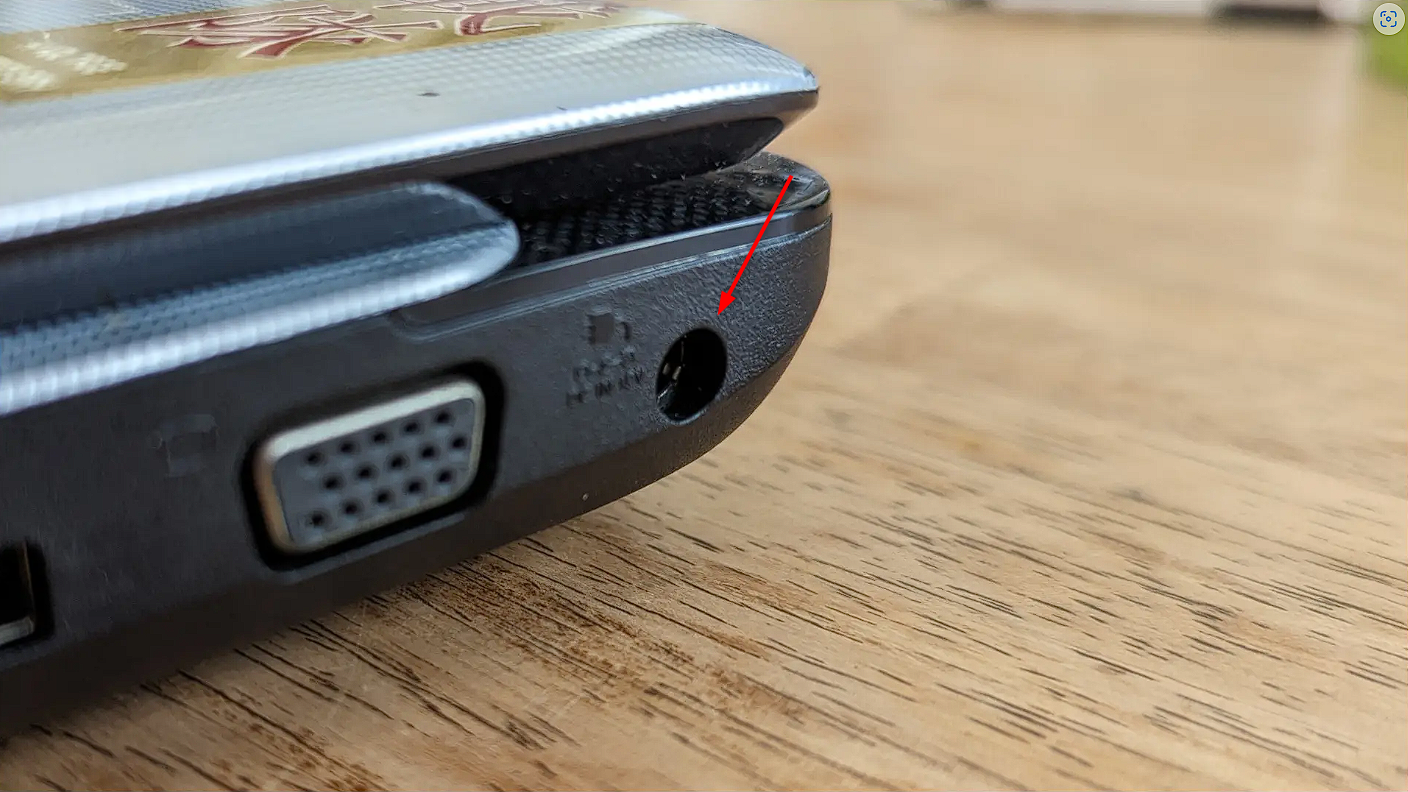 DC barrel power port on a laptop.
