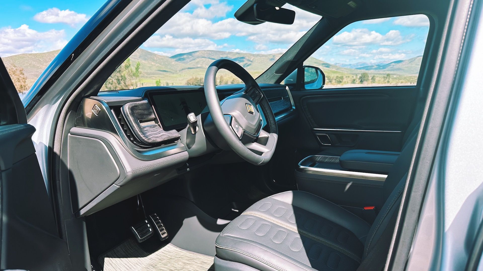 Showing the front seat interior of the Rivian R1T