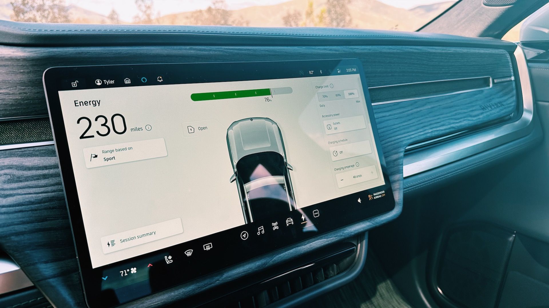 Showing Rivian R1T's 15-inch screen with 230 miles of range