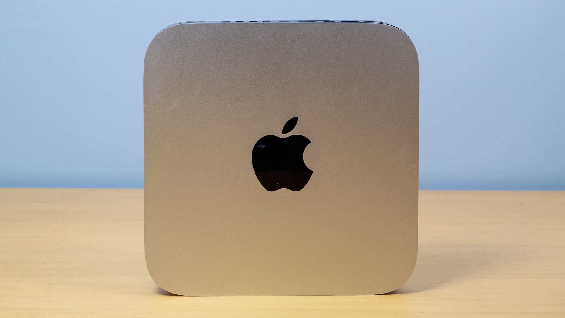 Apple Mac Mini propped on a table