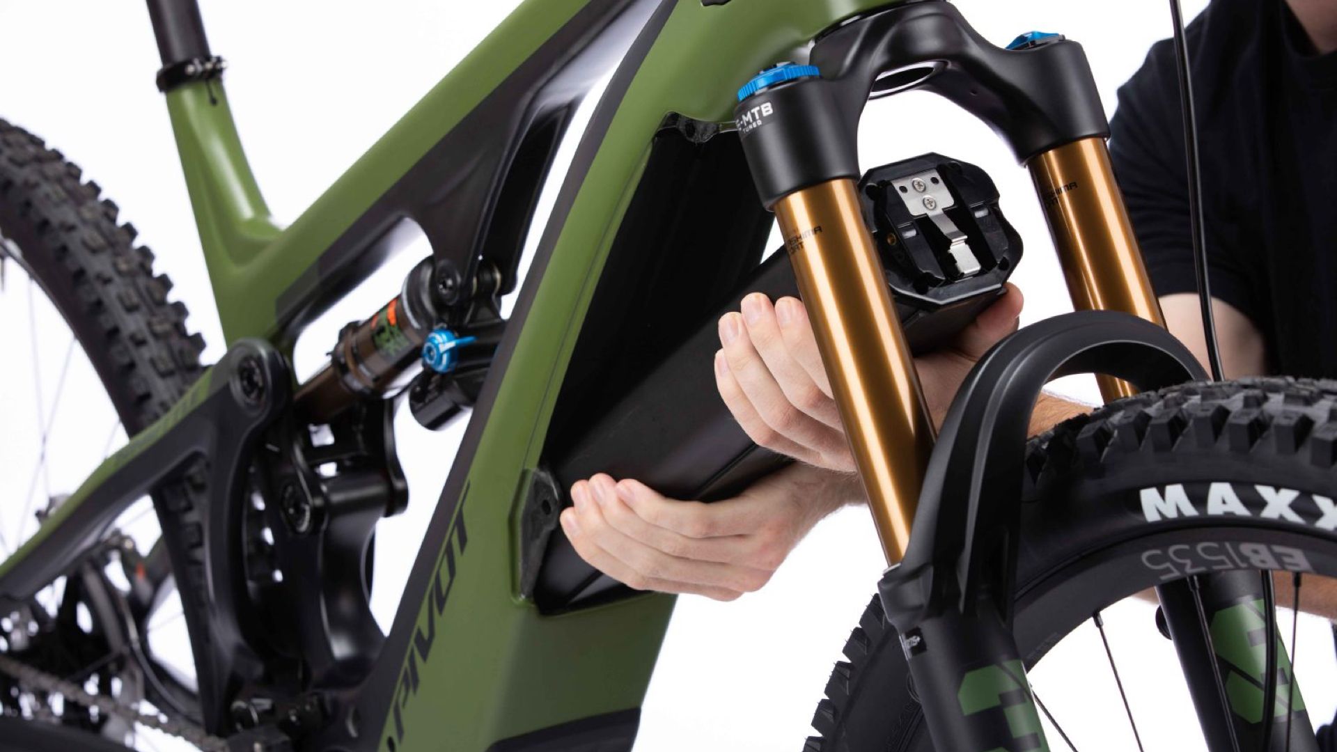 Man removing an ebike battery.
