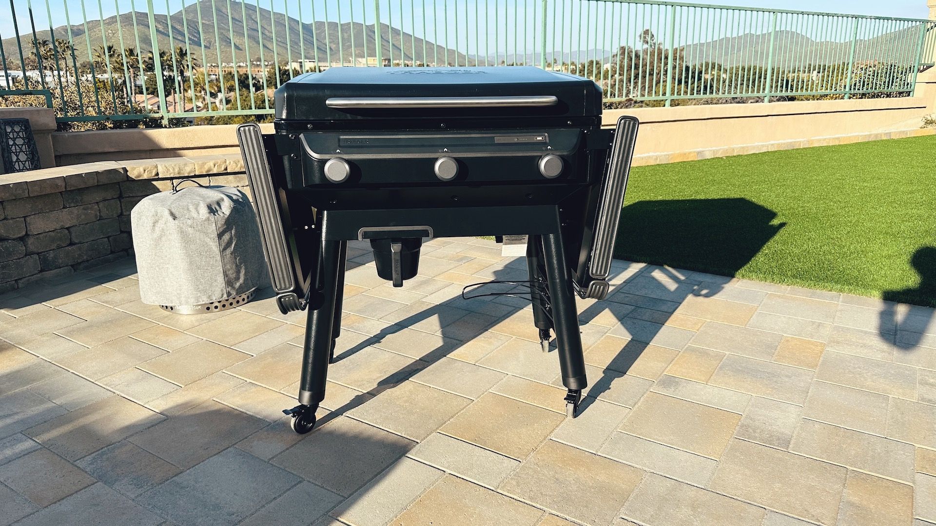 Traeger Flatrock grill with lid closed and shelves folded
