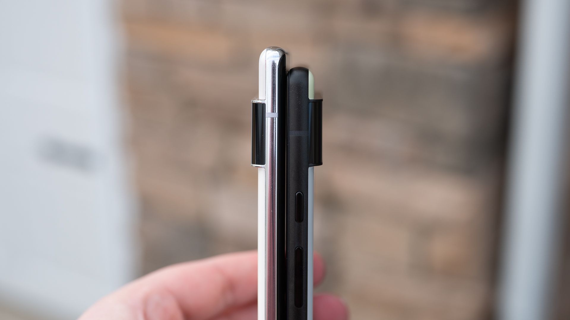 The Google Pixel 6 and 6 Pro pressed together to look like a foldable phone.