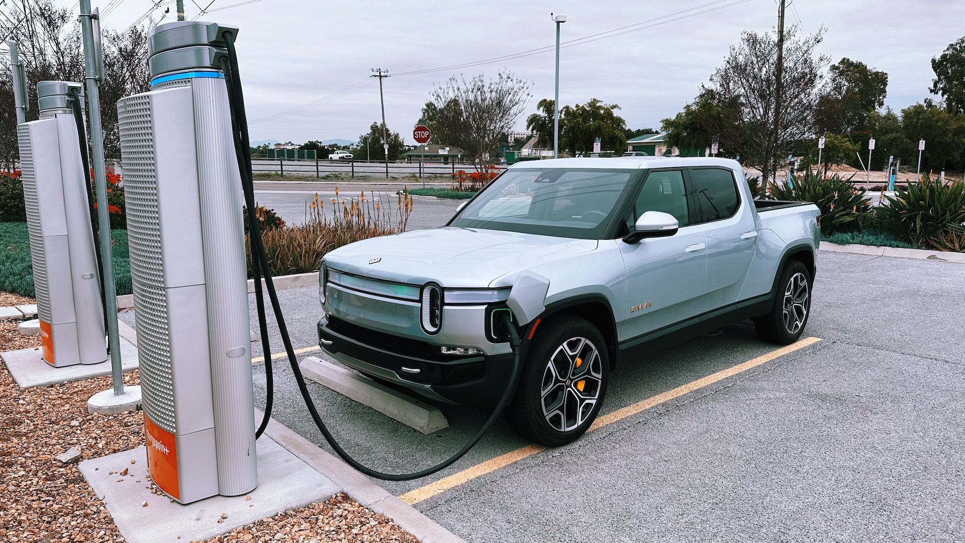 Rivian R1T plugged into a CCS charger