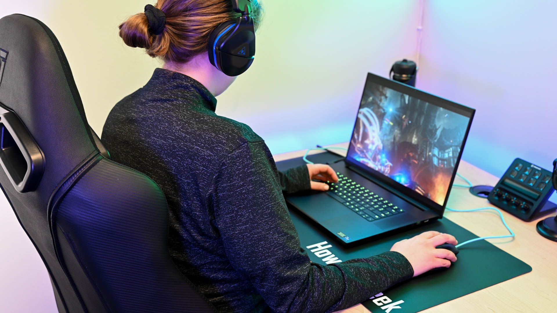 Person gaming on the Razer Blade 18.