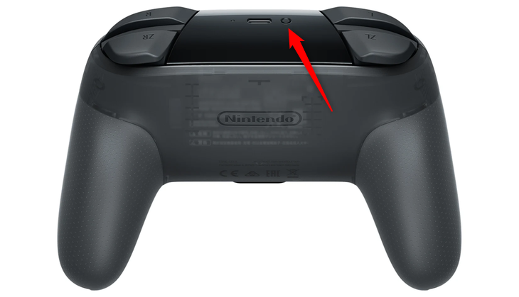 The sync button at the top of a Switch Pro Controller