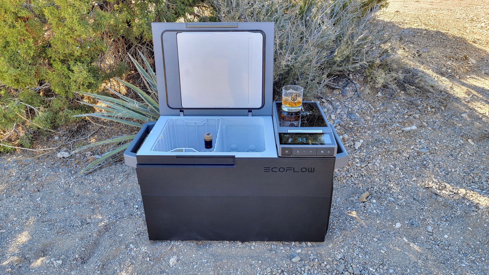 EcoFlow Glacier fridge opened with a drink on top.