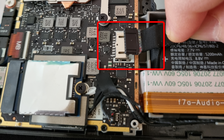 Make sure the battery connector is fully disconnected before removing the old SSD