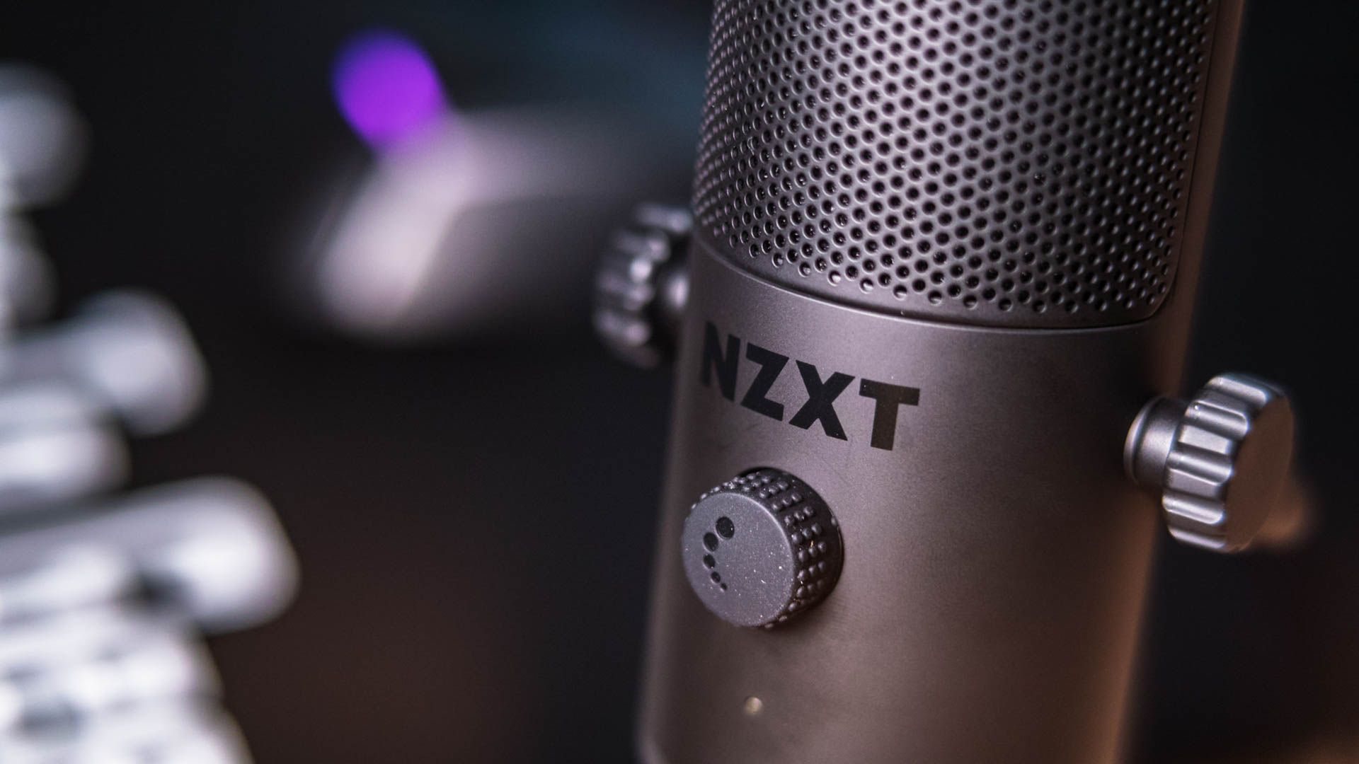 Dial and logo on the NZXT Capsule Mini-8