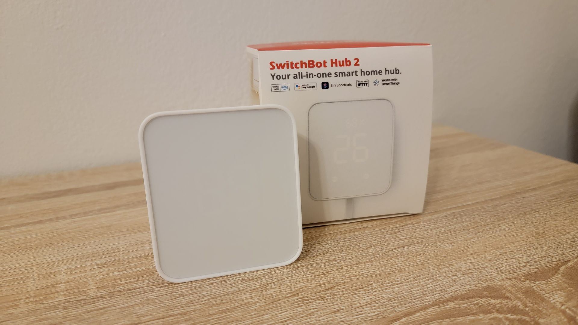 SwitchBot Hub 2 turned off sitting next to product box