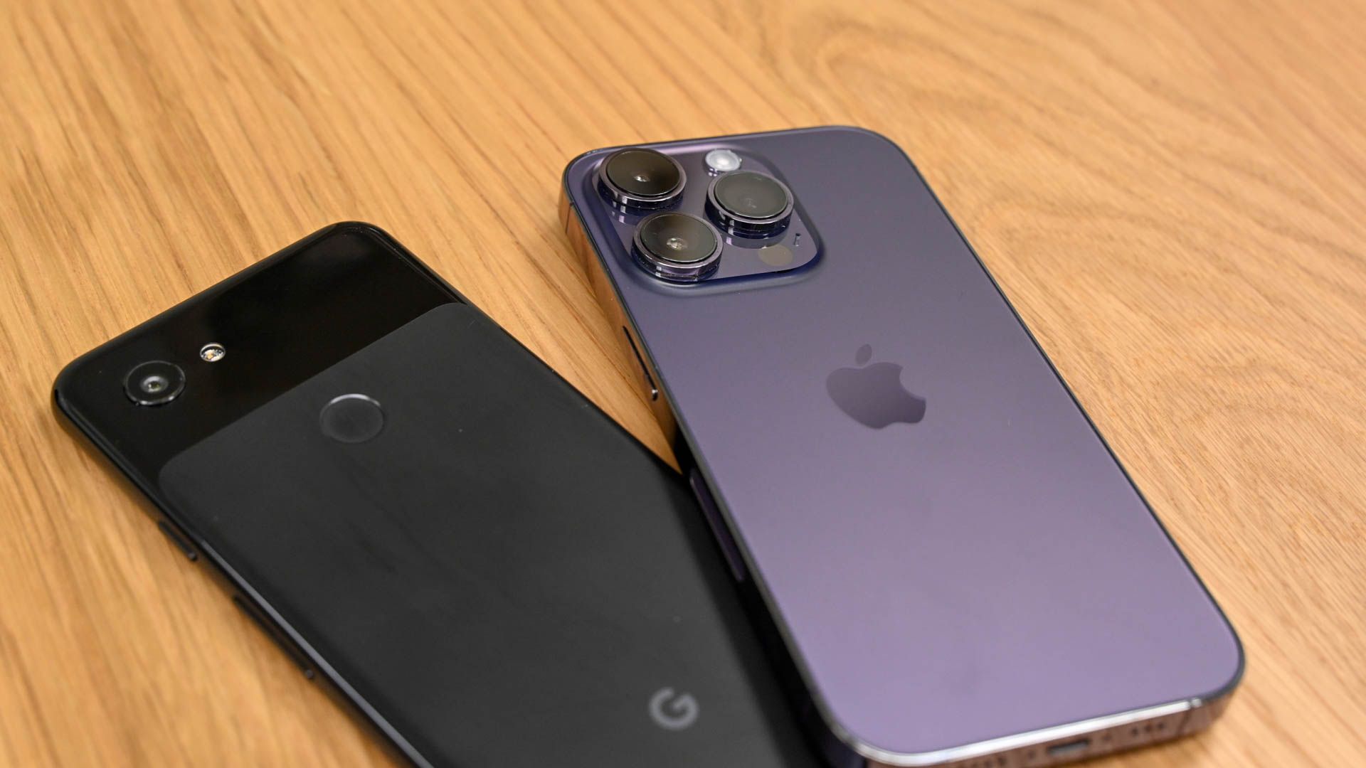 iPhone 14 Pro and a Google Pixel 3A
