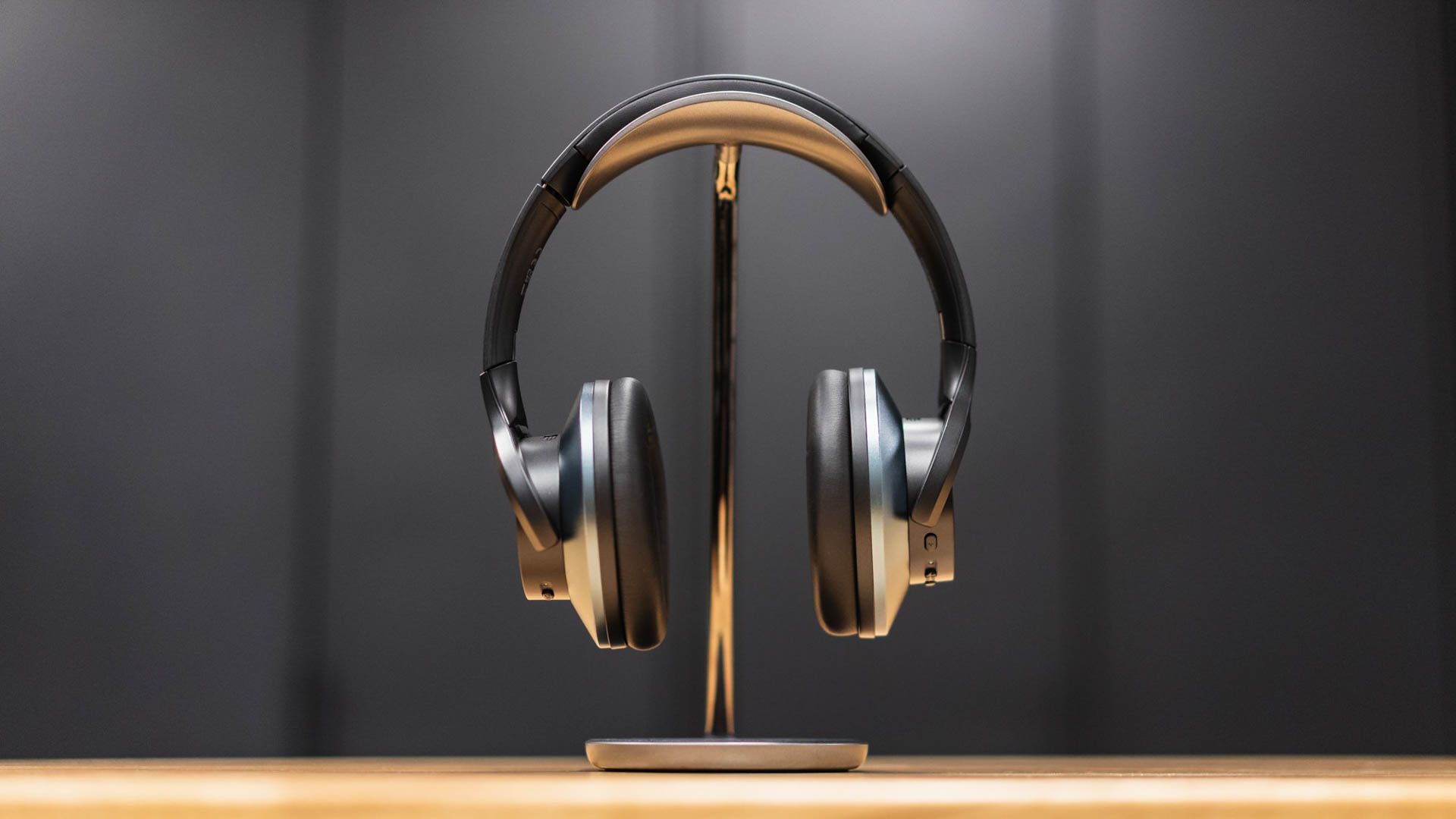 OneOdio A10 Hybrid Active Noise Cancelling Headphones on a headphone stand