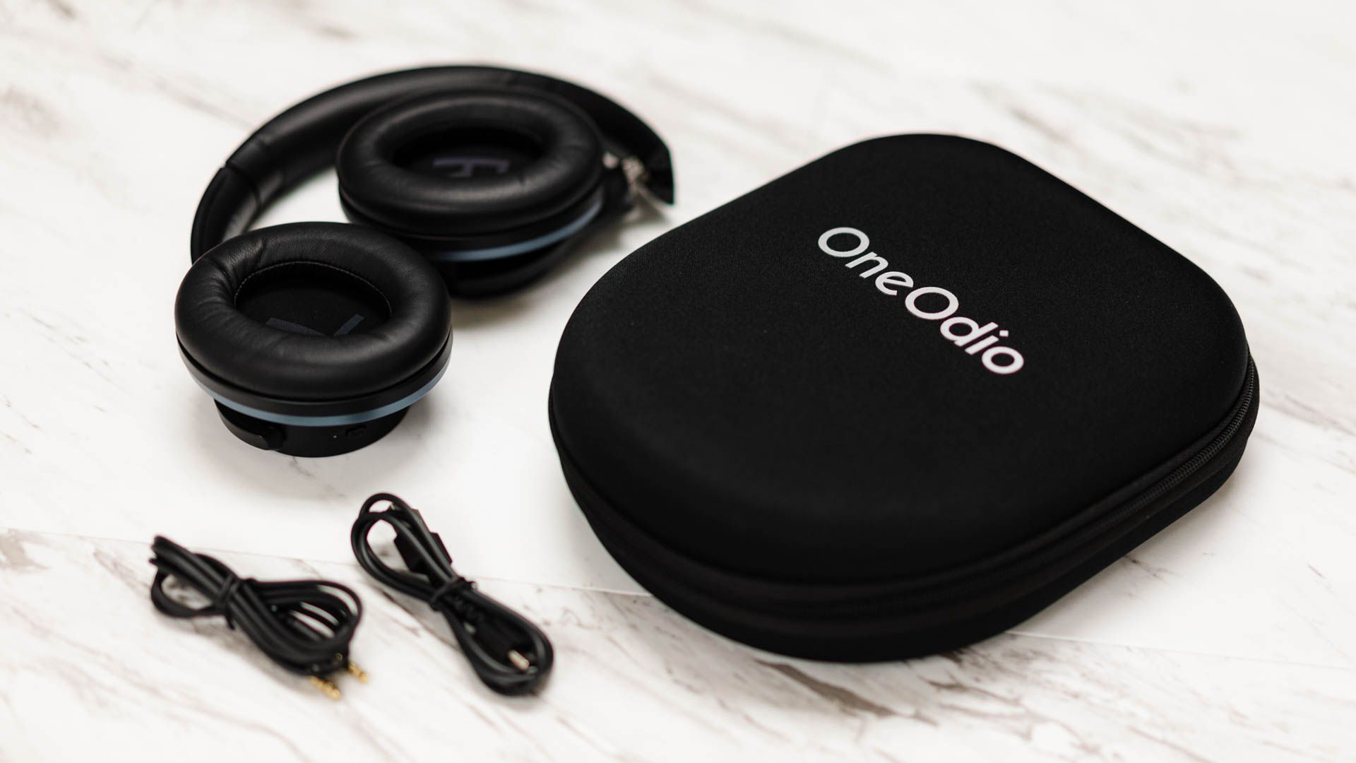 OneOdio A10 Hybrid Active Noise Cancelling Headphones with their case