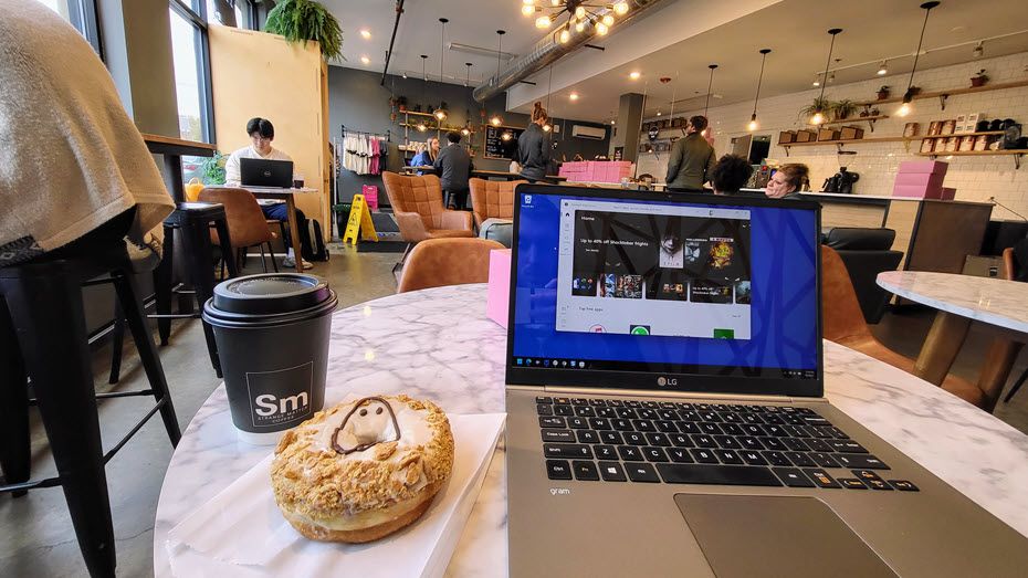 Laptop in coffee shop.