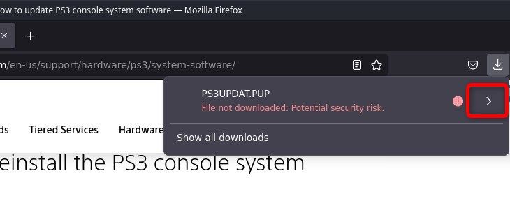 Firefox will refuse to download the file. To download the file anyway click on the arrow on the right-hand side of the download submenu