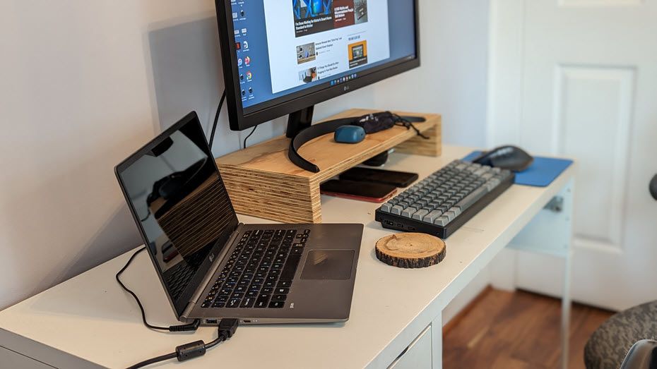 Laptop on desk with accessories.
