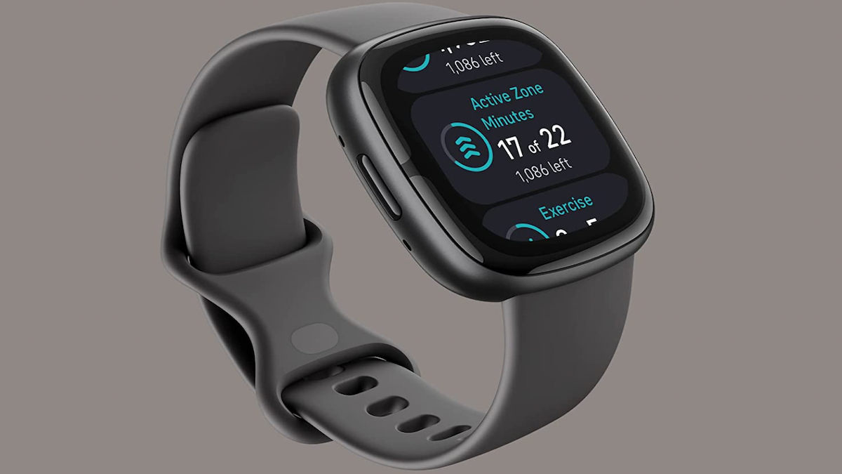 Fitbit with a dark gray strap.