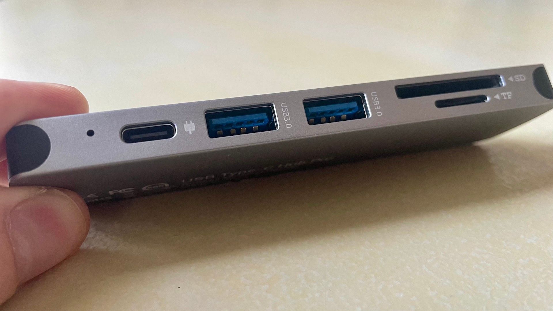 USB and SD card slots on the side of the Hiearcool 7-in-1 USB-C Adapter