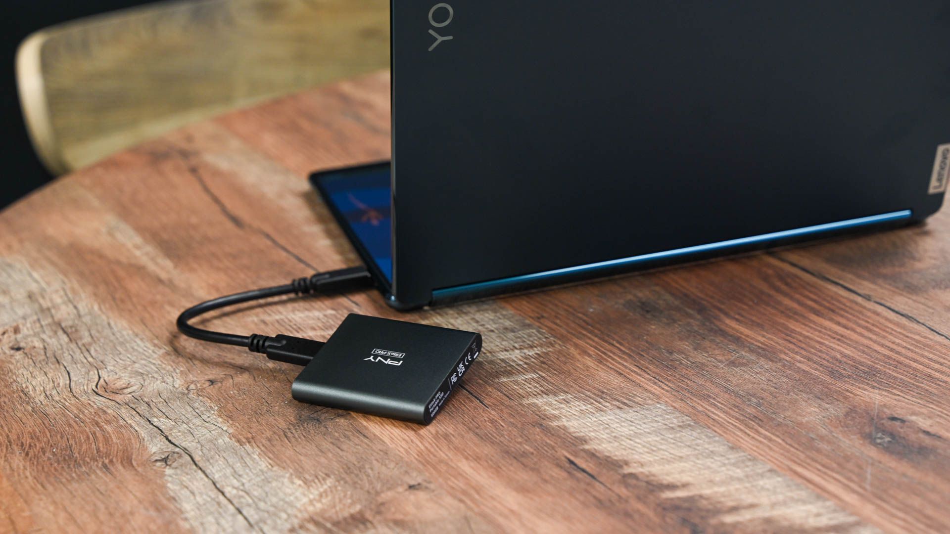 The PNY EliteX-PRO plugged into a laptop.