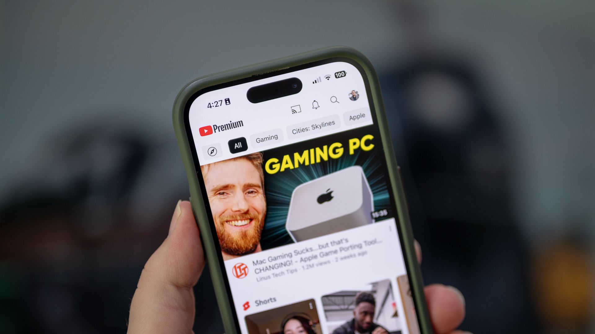 YouTube Premium in the YouTube mobile app running on an Apple iPhone 14 Pro.