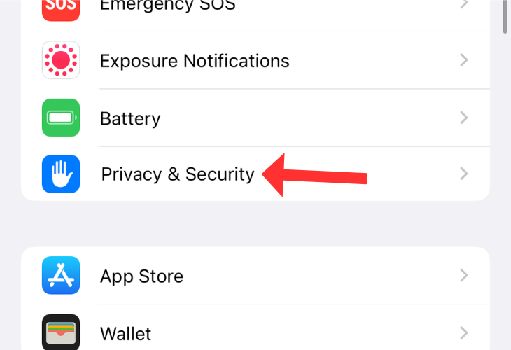 iPhone's settings app menu with an arrow next to the Privacy & Security settings option