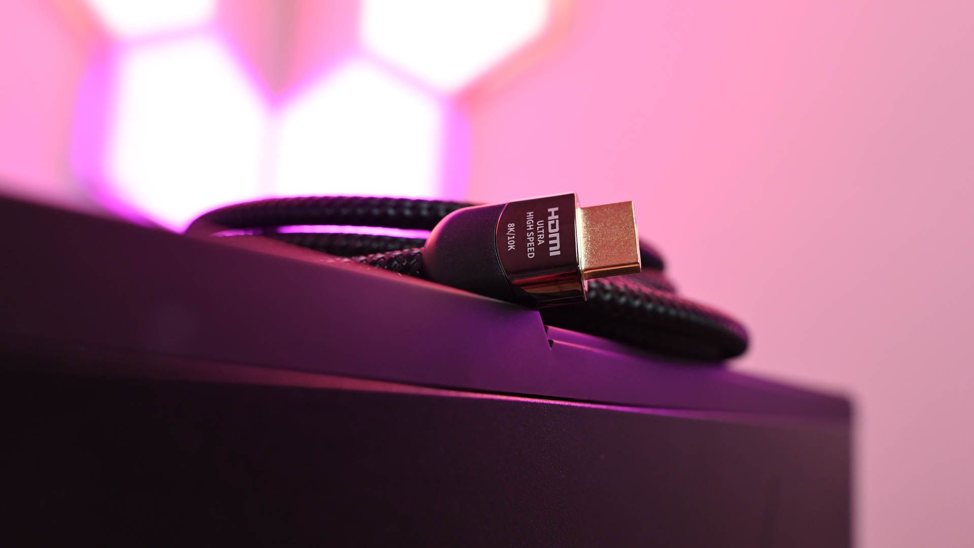 Zeskit Maya 8K High-Speed HDMI Cable laying on a computer