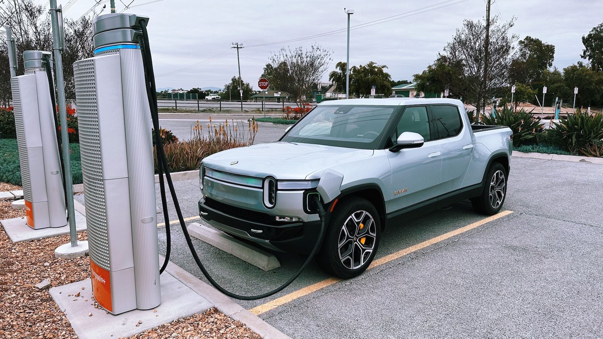 Rivian R1T plugged into a ChargePoint CCS charger. 