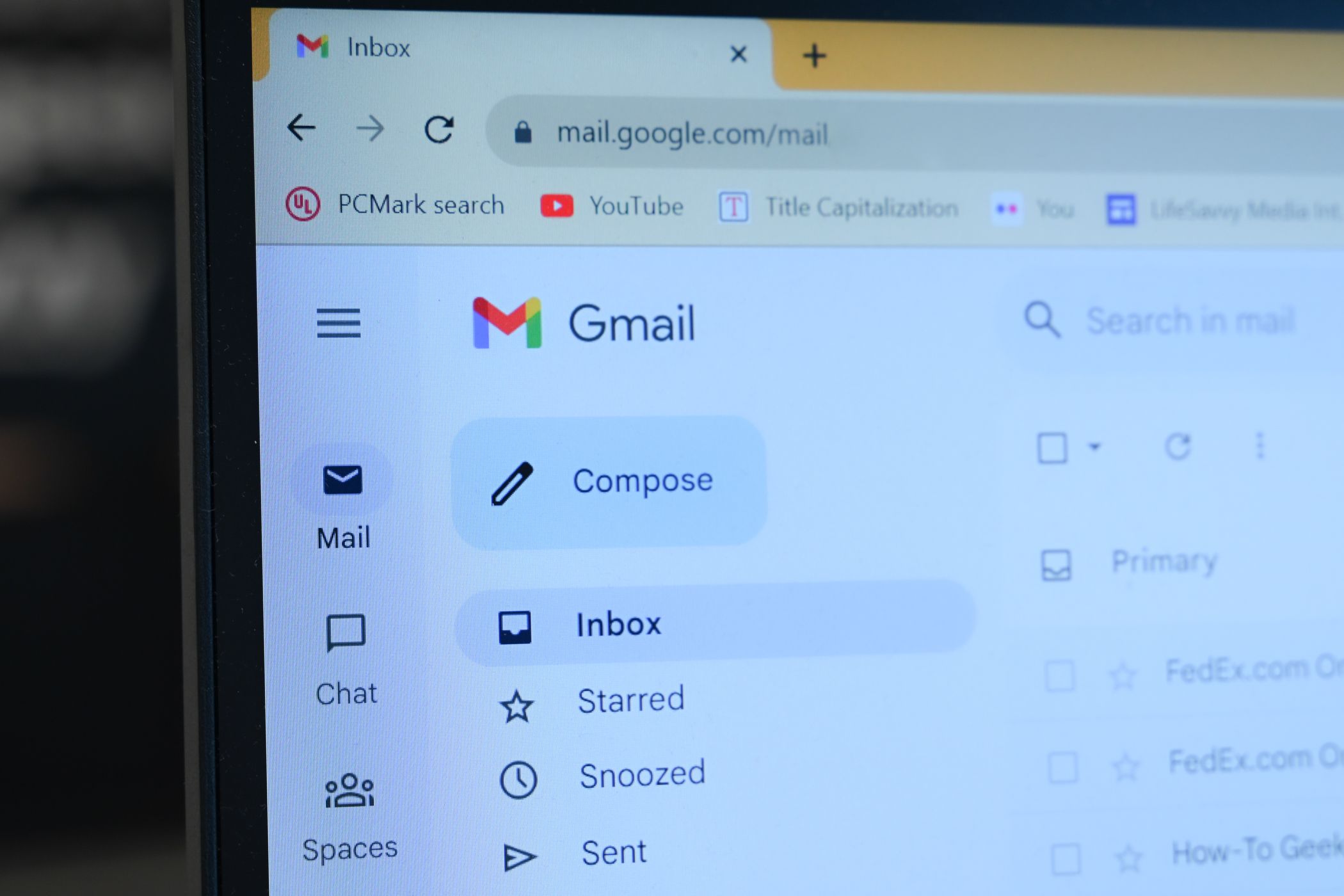 The upper left hand corner of the Gmail interface. 